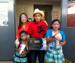 (Pictured: The Castillo family were the proud winners of the Wii gaming system and several games in the raffle)