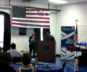 Atlantic States HR Manager Paul Carbo presents Congressman Lance with Eagle Hard Hat