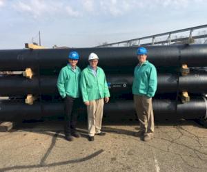 In the photo (L-R) Tom Crawford, MDO general manager; Sen. Hottinger; Jeff Otterstedt, senior vice president, McWane Ductile