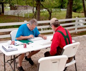 Pictured L-R: Tyler Coupling team members Jeff Morris and Randy Witherspoon perform Stream Team Monitoring Activities along the Pomme de Terre River