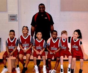 Edward is pictured with his four to six year old team from L-R: Jalyn, Addison, Kevin, Kane, Payton and Ruby